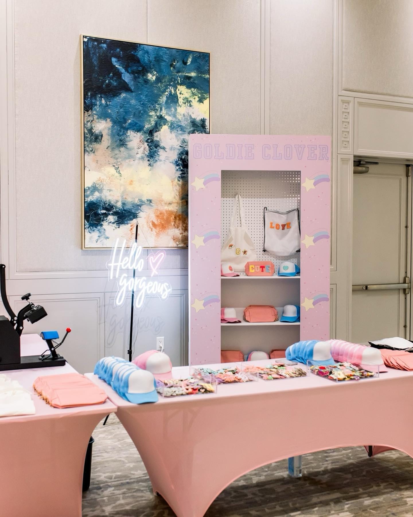 A styled activity station with hat bar and crafts at a private party venue